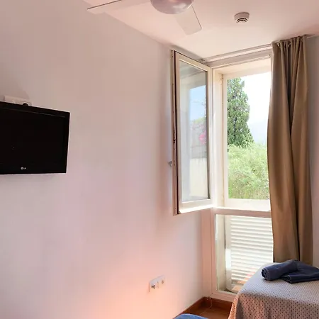 Casa Adela /terraza/5m Playa / Aire Acondicionado Дом отдыха Кадакес